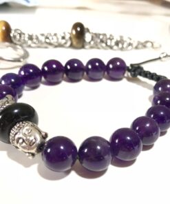 Silver Buddha head with Amethyst